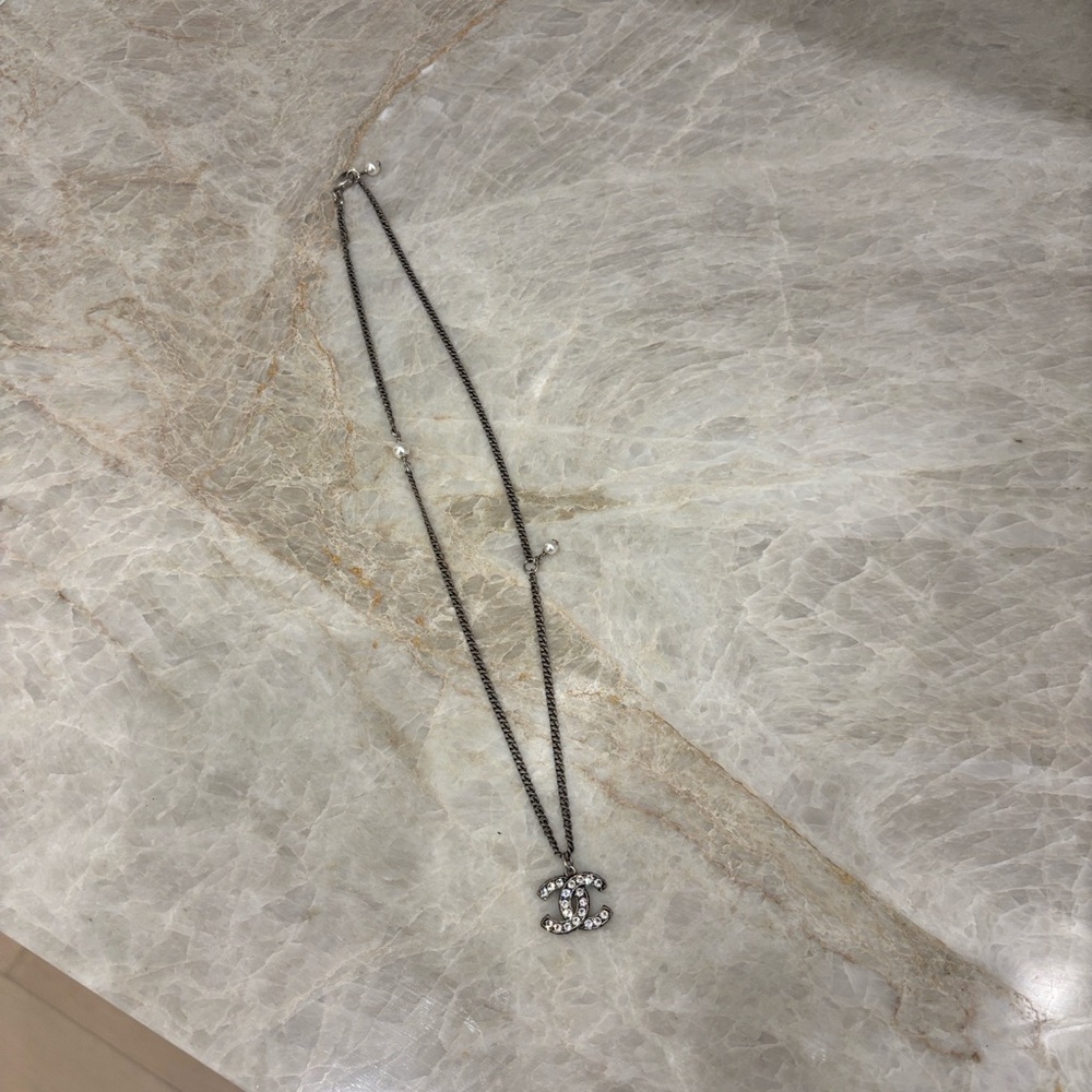 CHANEL Silver and Black Pendant Necklace